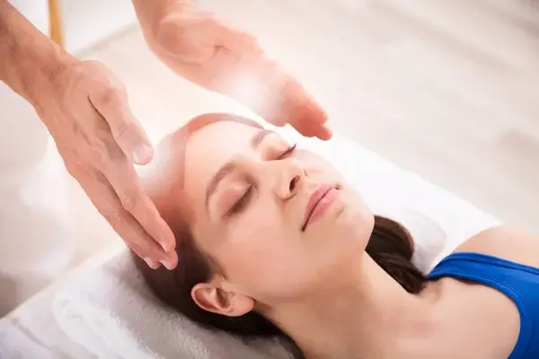 Depositphotos 202170530 stock photo close therapist hand performing reiki